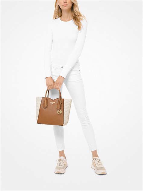 michael kors mae medium messenger|Mae Medium Pebbled Leather and Logo Messenger Bag.